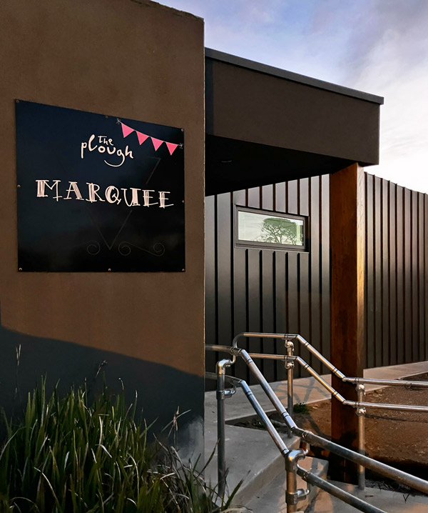 The Plough Myrniong – Marquee function centre entrance with signage, modern metal cladding and accessible ramp.